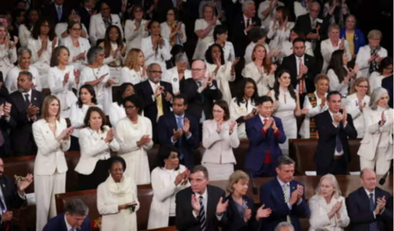 Members of Democratic Women's Caucus wear white, pins for reproductive freedom at State of the Union